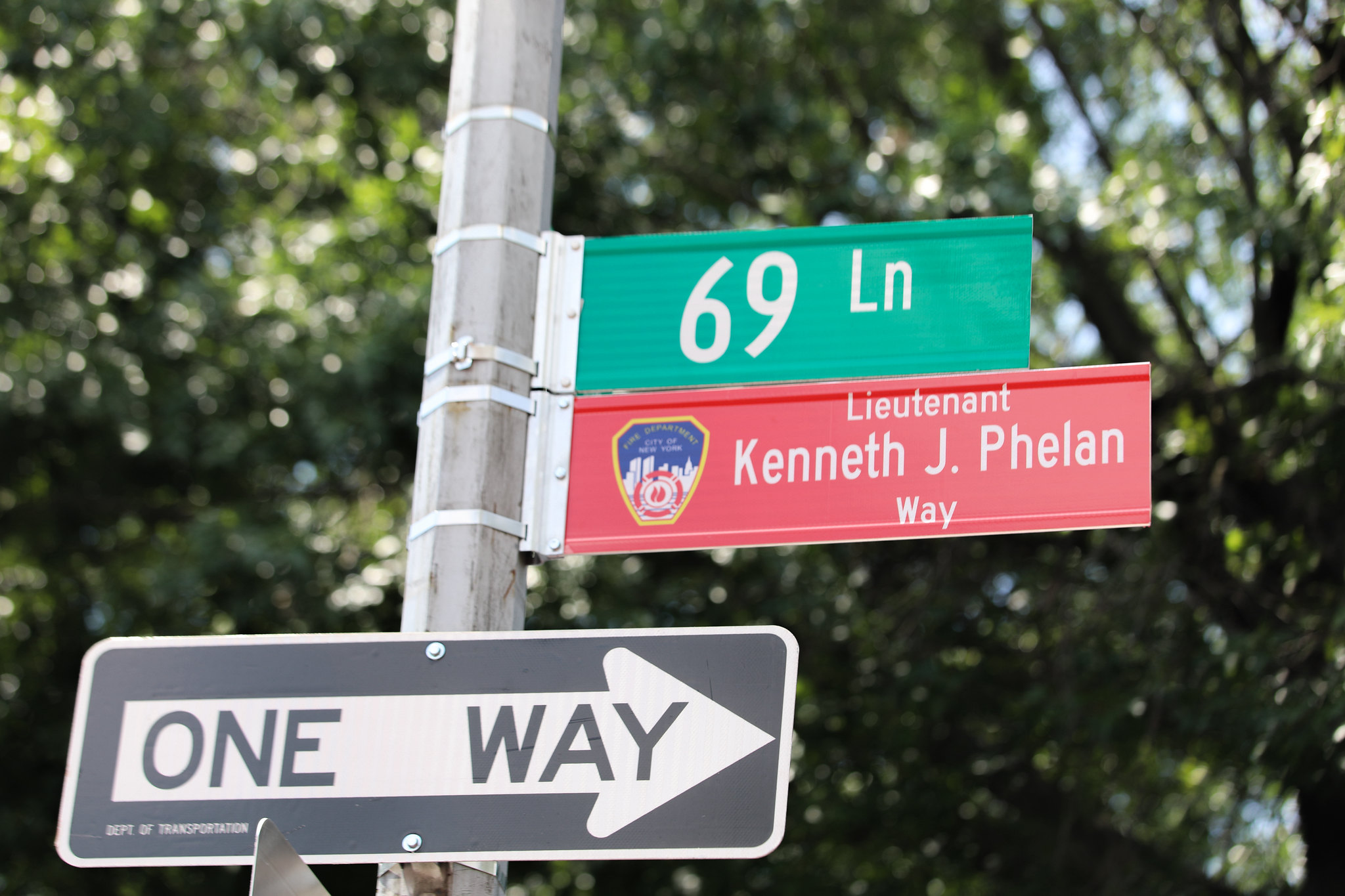 Speaker Menin, Council Member Wong, FDNY and Phelan Family Unveil New Memorial Street Sign Honoring 9/11 Hero Lt. Kenneth J. Phelan Sr.
